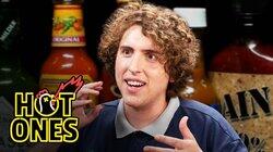Andrew Callaghan Goes For the Marrow While Eating Spicy Wings