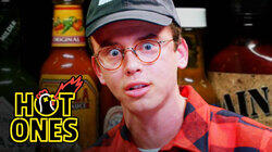 Logic Solves a Rubik's Cube While Eating Spicy Wings