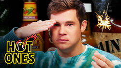 Adam Devine Gets Patriotic While Eating Spicy Wings Adam Devine Gets Patriotic While Eating Spicy Wings