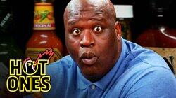 Shaq Tries to Not Make a Face While Eating Spicy Wings Shaq Tries to Not Make a Face While Eating Spicy Wings